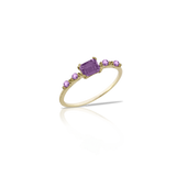 Gold solitaire ring with central bezel