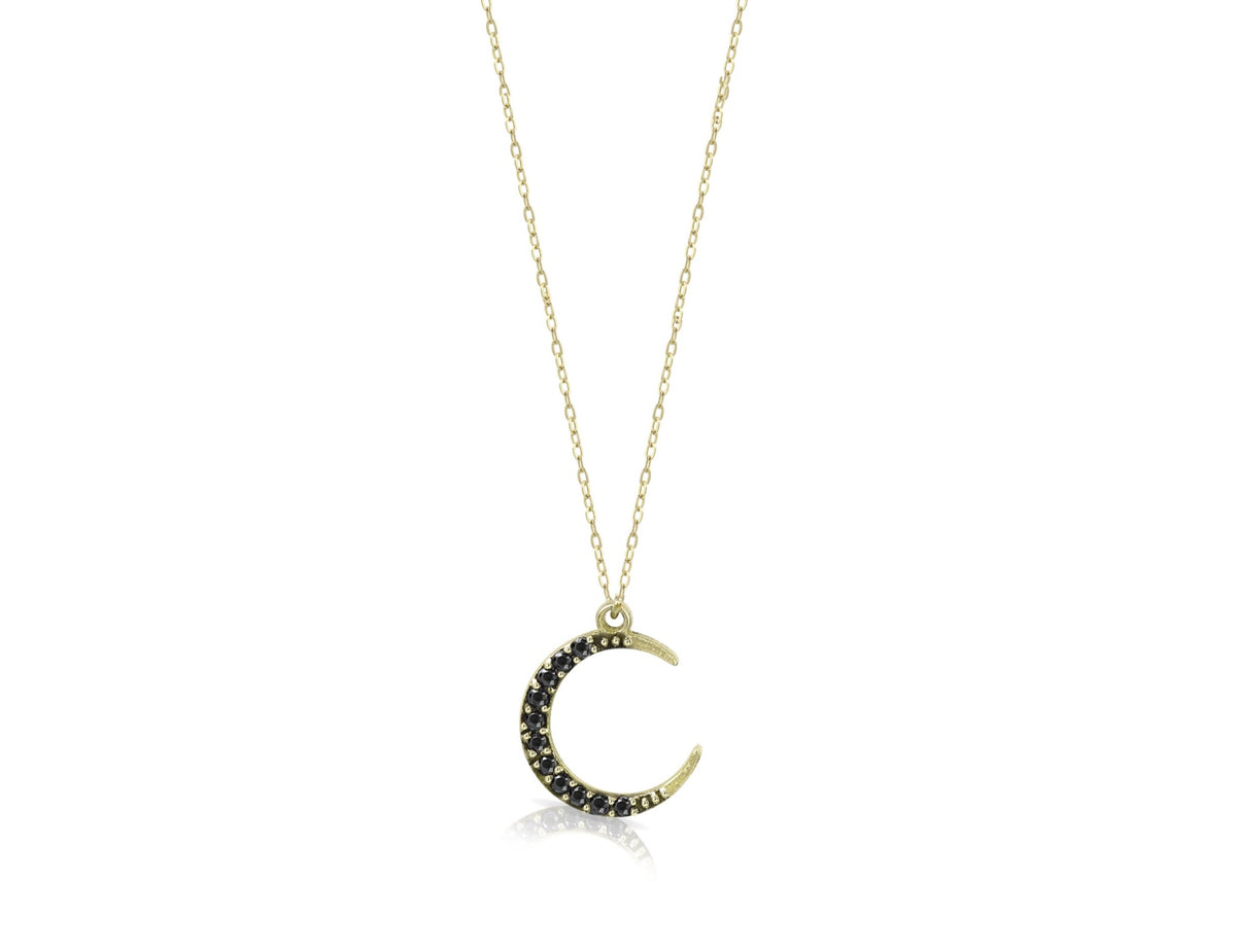 Collana in oro con ciondolo a forma di luna e diamanti neri