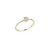 Anello punto luce in oro 18 kt con castone centrale conico 0,10ct