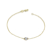 18kt gold bracelet with round central bezel