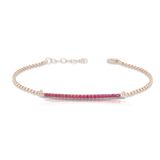 Pulsera de tenis en oro de 18 kt y rubíes.