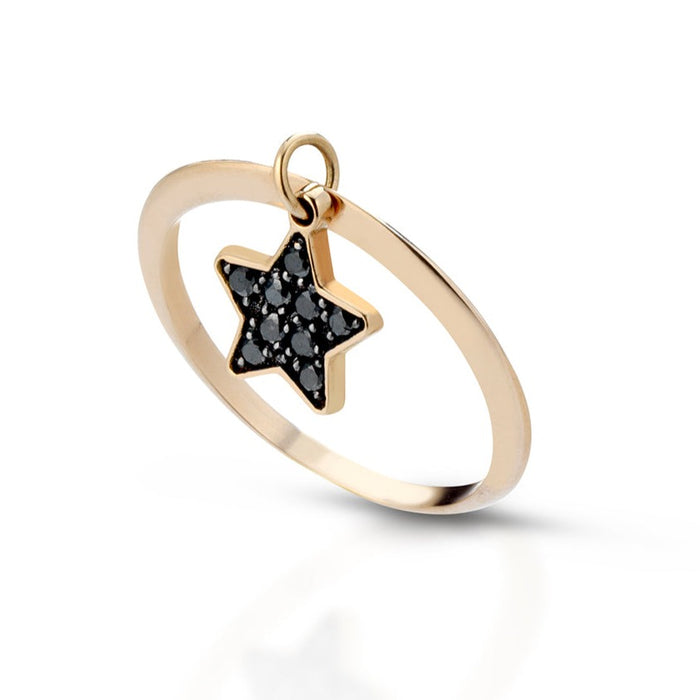Anello in oro con charm a forma di stella e diamanti neri