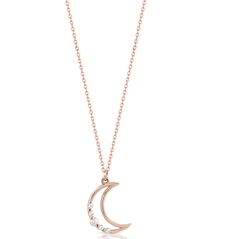 Collana in oro con ciondolo a forma di luna e diamanti bianchi