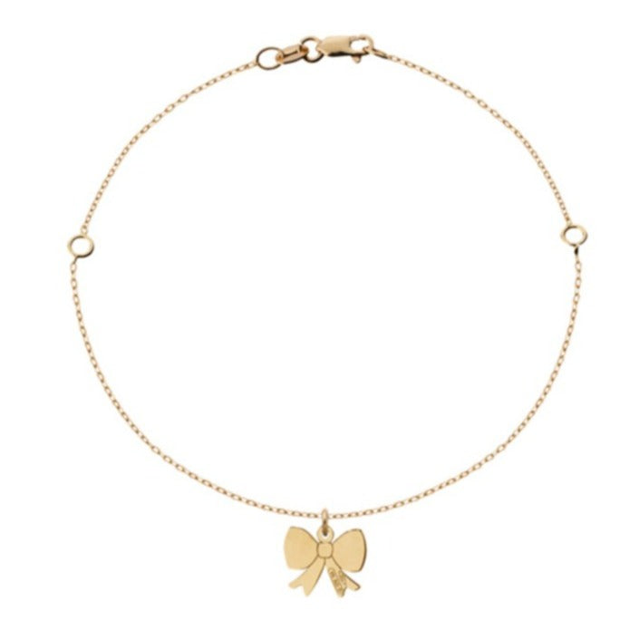 Bracciale in oro con ciondolo a forma di fiocco