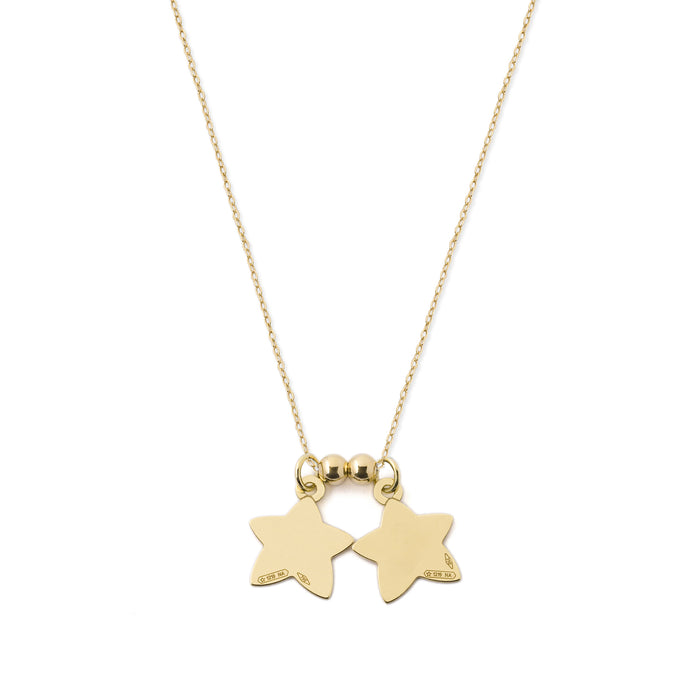 Collana in oro con doppio ciondolo a forma di stella