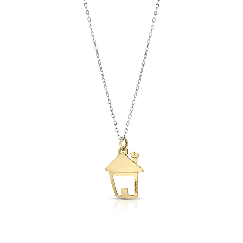 Necklace with gold pendant in the shape of a house